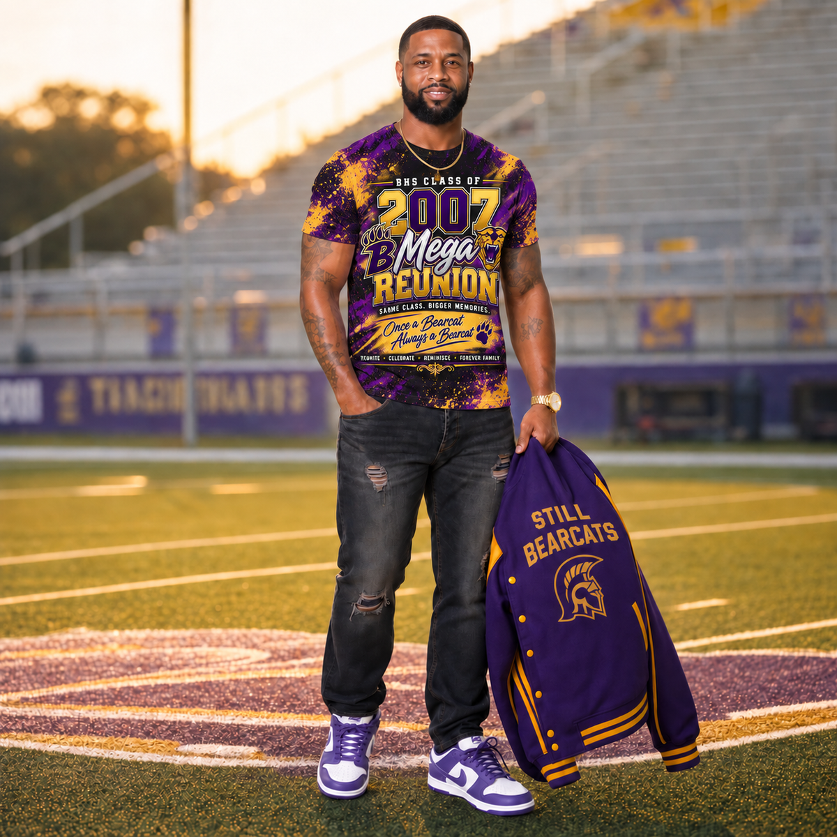 Man wearing the Class of 2007 all-over reunion T-shirt on a football field